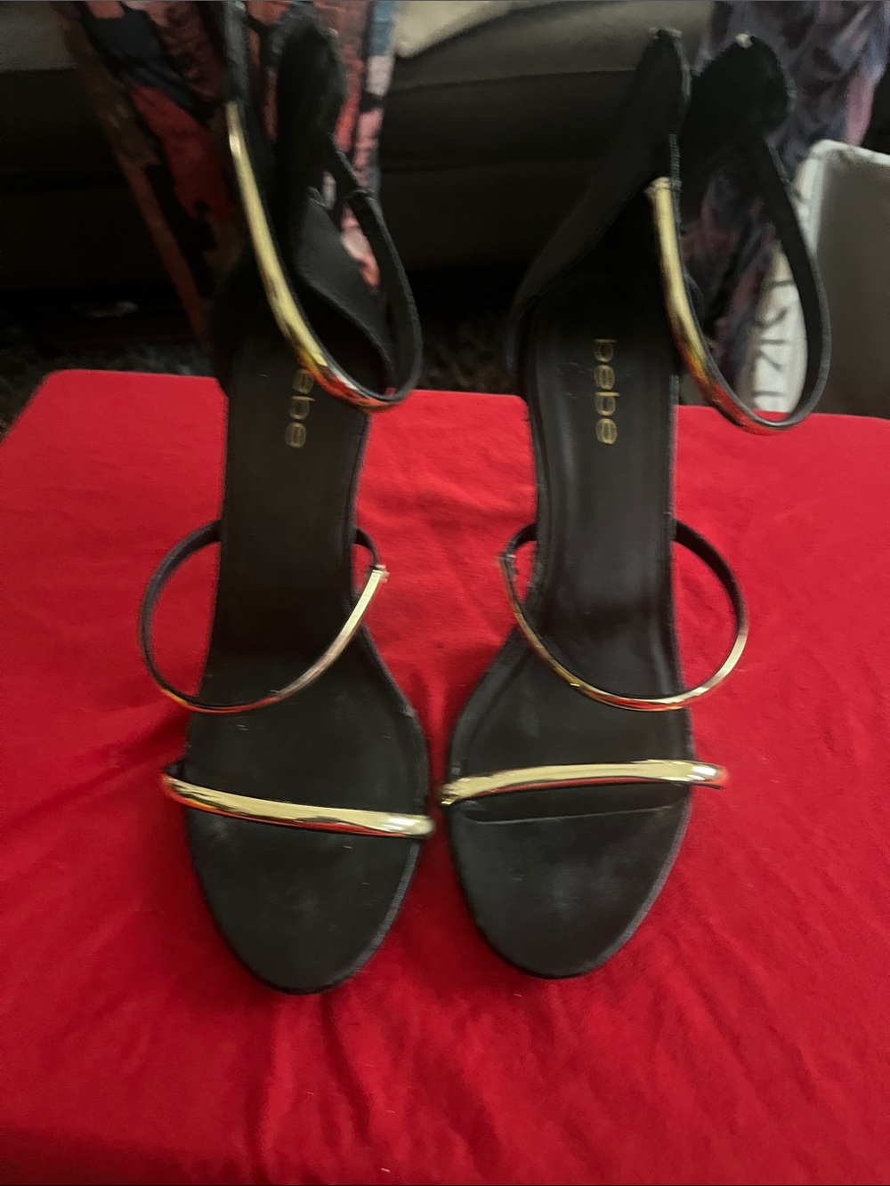 bebe Black Heeled Sandals with Gold Accents